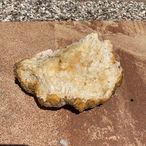 Yellow citrine crystal with deep yellow points.